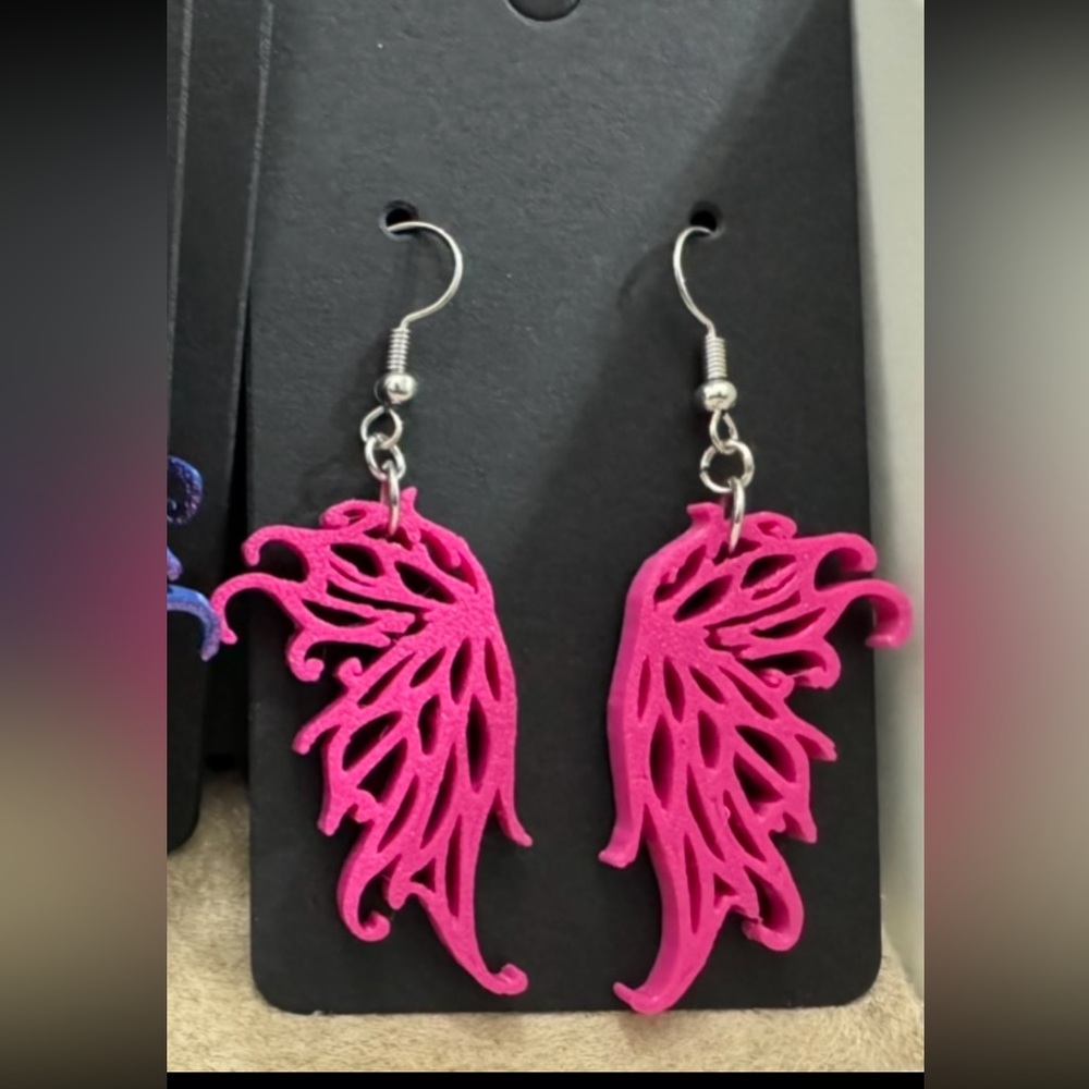 Beautiful pink fairy wing earrings